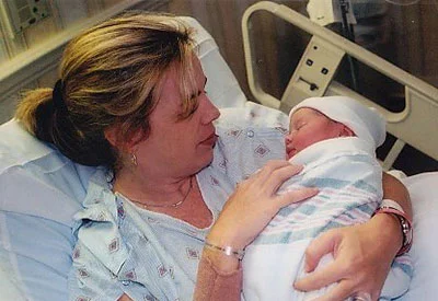A birth professional caring for a newborn
