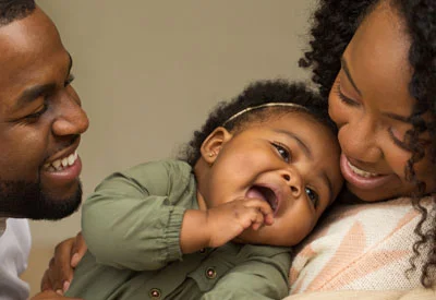 Parents sharing a moment with their baby